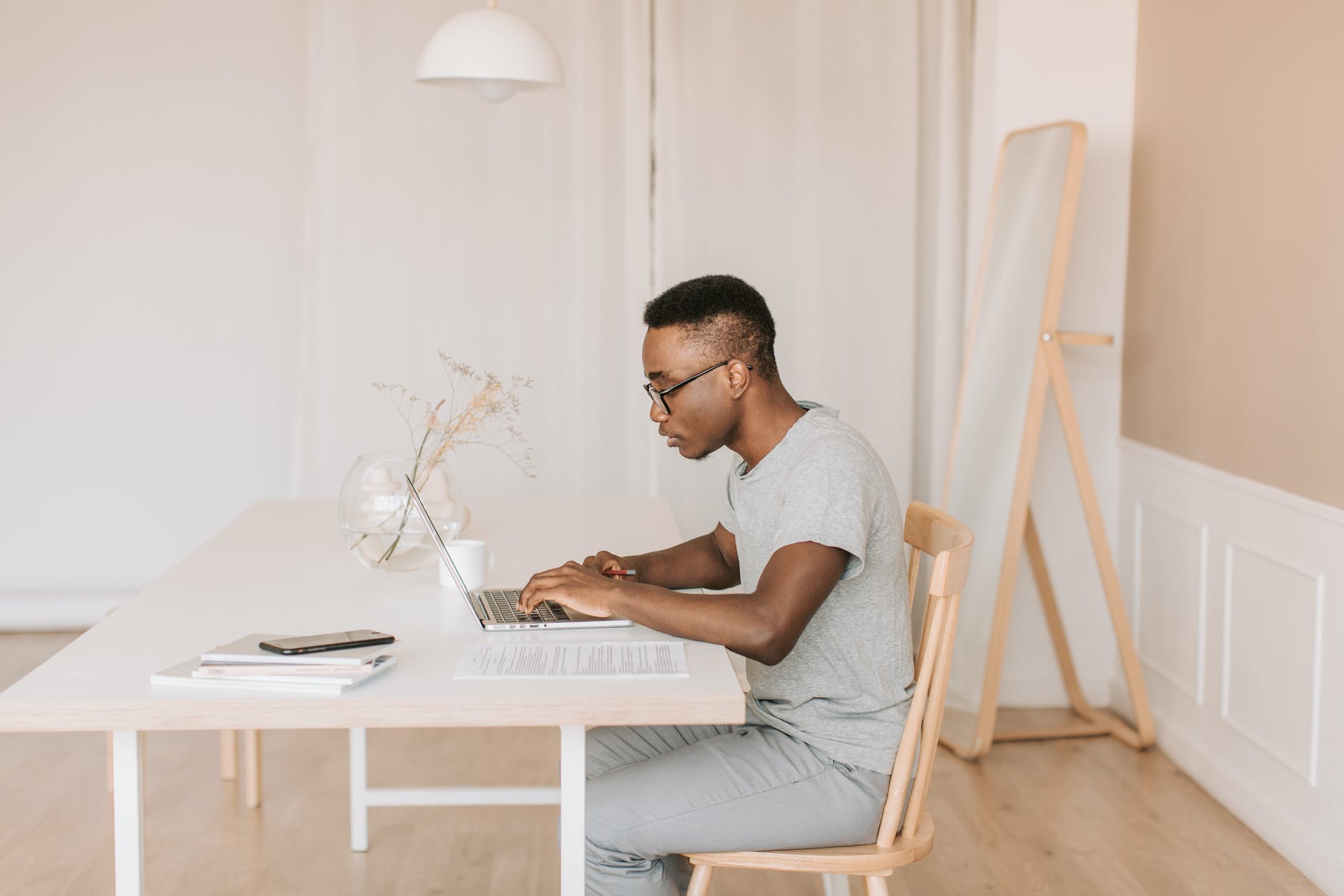 Man Studying Laptop At Home